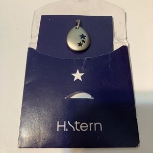 H. Stern pewter charm